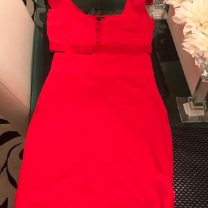 Red two piece Bebe skin tight skirt and crop top